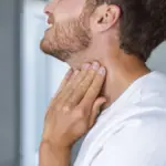 Sintomi della Disfunzione della Tiroide nell'Uomo: Guida Completa ai Segnali, Controlli e Fattori di Rischio