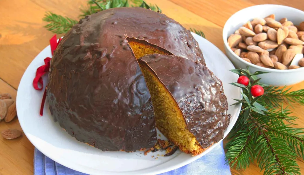 Parrozzo abruzzese: mandorle e cioccolato per un dolce natalizio dal sapore autentico.
